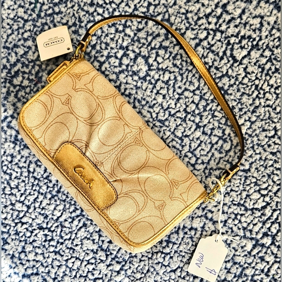 Coach Handbags - Coach wristlet bag.